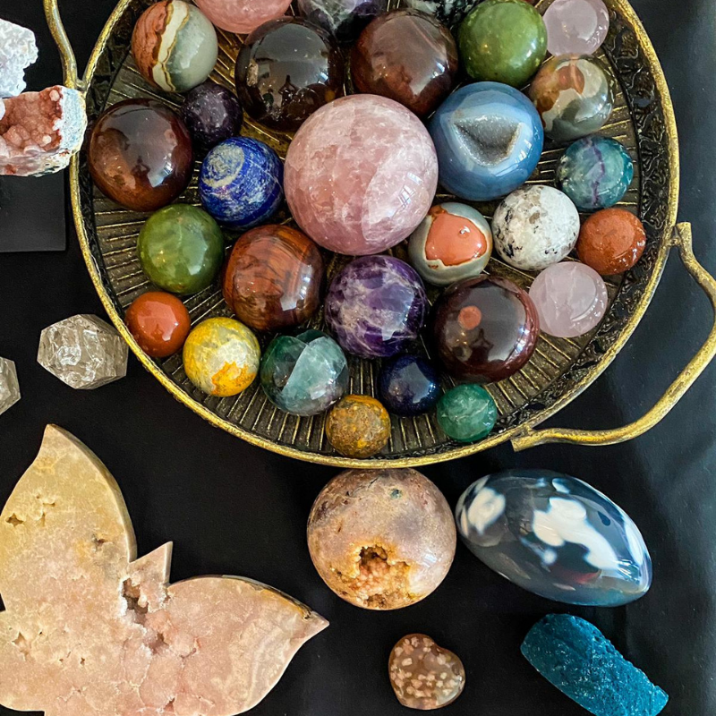 Crystal spheres and other shapes on a display table