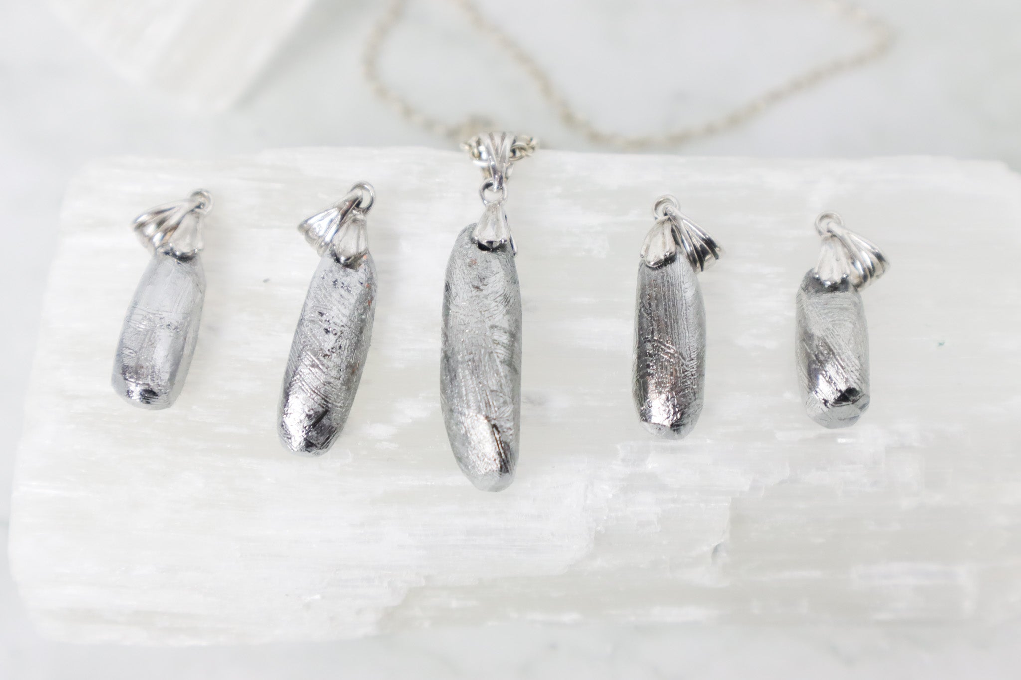 Muonionalusta Pendants