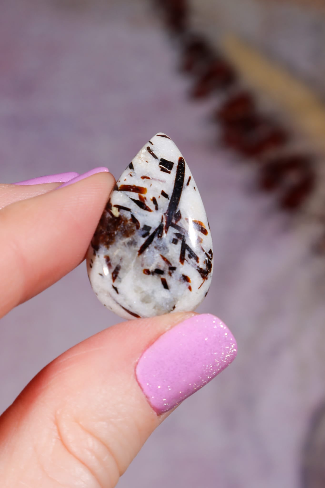 Astrophyllite Cabochon | Teardrop | Russia Cabochon Piece A (small) - Weight: 5.14g | Size: 3.0 × 1.9 × 0.6 cm Tali & Loz Crystals