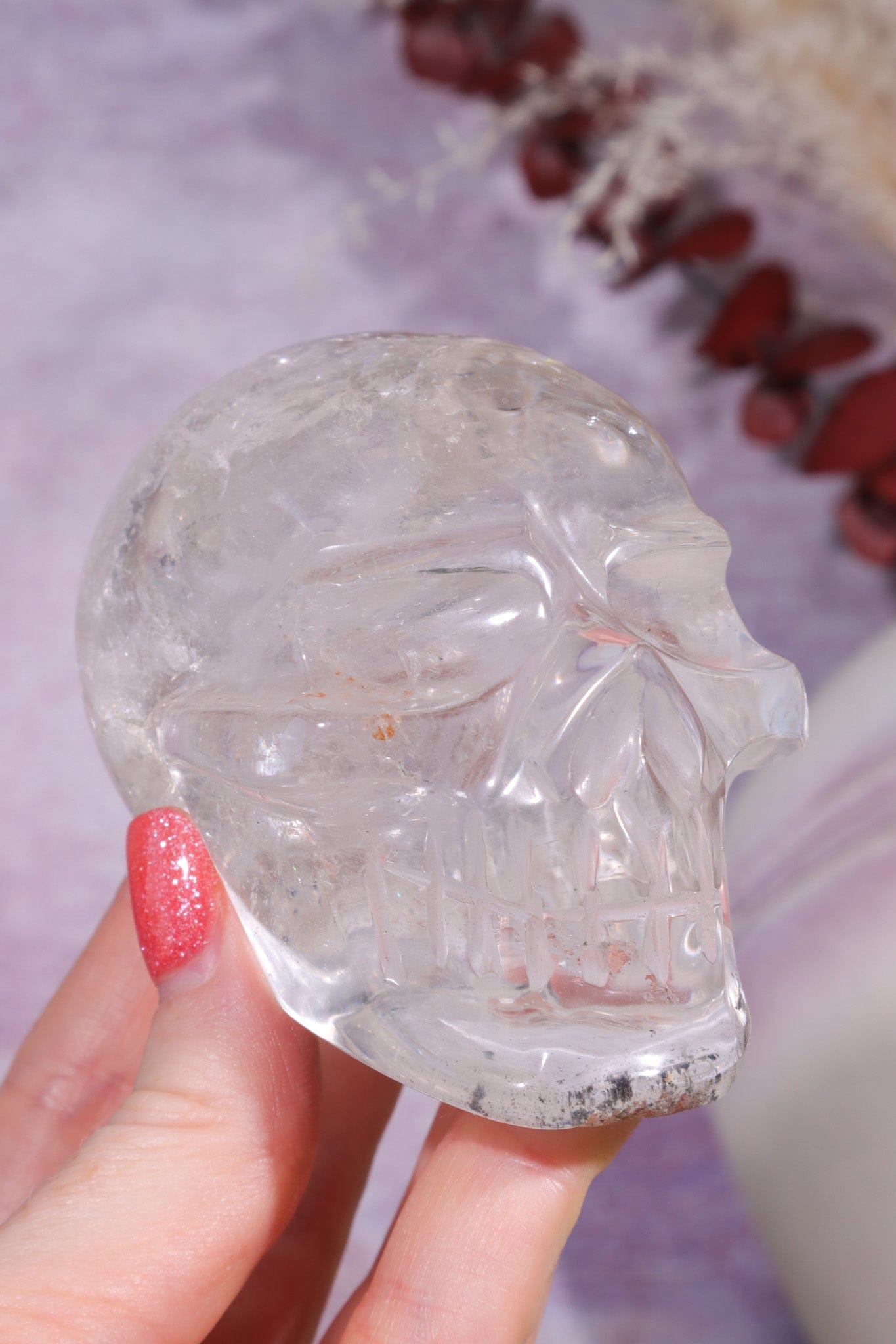 Clear Quartz with Graphite Inclusions Skull Carving Tali & Loz Crystals